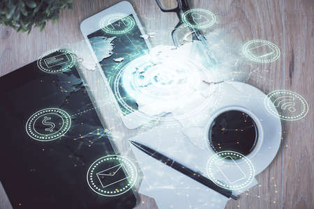 Double exposure of social network theme drawing over table with phone. Top view. People connecting concept.の写真素材