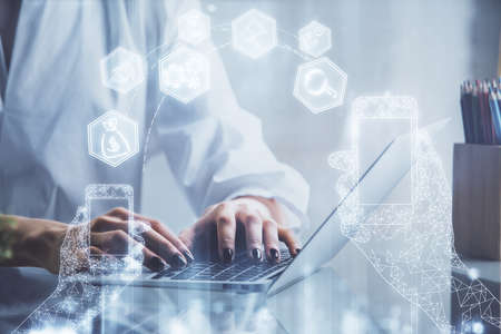 Double exposure of woman hands typing on computer and technology theme drawing. High Tech concept.