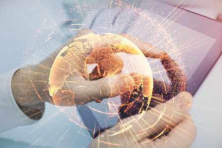 Double exposure of man's hands holding and using a phone and social network theme drawing.の写真素材