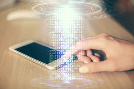Double exposure of technology sketch hologram and woman holding and using a mobile device. Ai conceptの写真素材