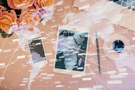 Multi exposure of technology theme drawing over work table desktop. Top view. Global data analysis concept.の写真素材