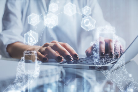 Double exposure of woman hands typing on computer and technology theme drawing. High Tech concept.の写真素材