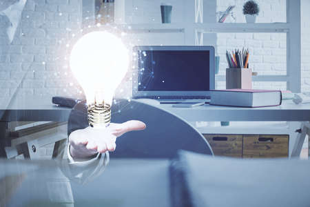 Double exposure of bulb and office interior background. Concept of idea.の写真素材