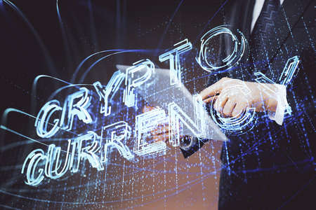 Double exposure of man's hands holding and using a phone and crypto currency blockchain theme...
