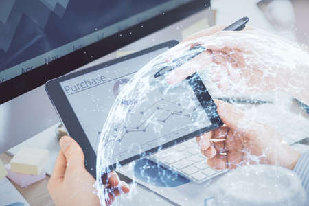 Double exposure of man's hands holding and using a phone and social network theme drawing.の写真素材