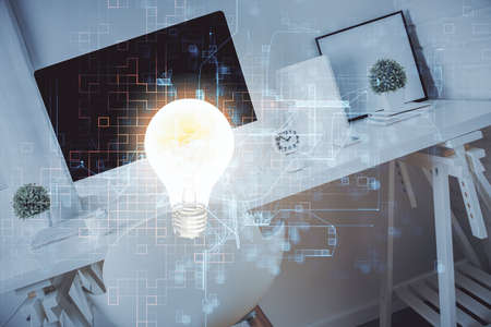 Double exposure of bulb and office interior background. Concept of idea.