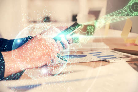 Multi exposure of man's hands holding and using a digital device and data theme drawing. Innovation...