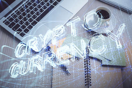 Blockchain theme hologram drawings over computer on the desktop background. Top view. Double exposure.の写真素材