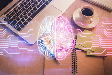 Double exposure of brain drawing hologram over topview work table background with computer. Concept...