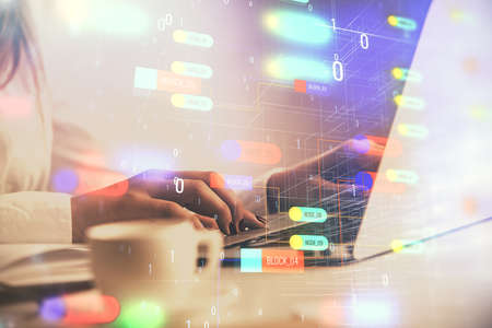 Multi exposure of woman hands working on computer and data theme hologram drawing. Tech concept.