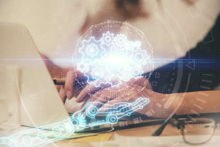 Multi exposure of woman hands working on computer and data theme hologram drawing. Tech concept.