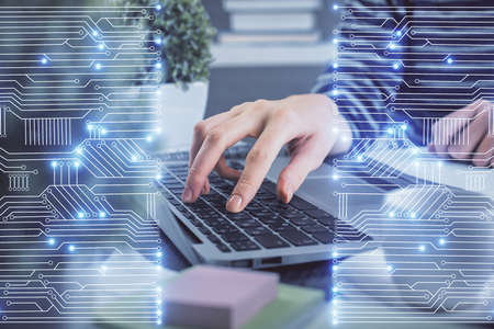Double exposure of woman hands typing on computer and technology theme drawing. High Tech concept.