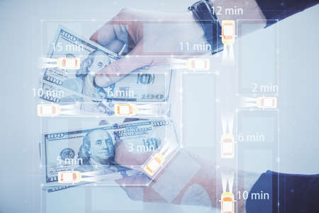 Multi exposure of Tech taxi drawing hologram and USA dollars bills and man hands. Technology concept.の写真素材