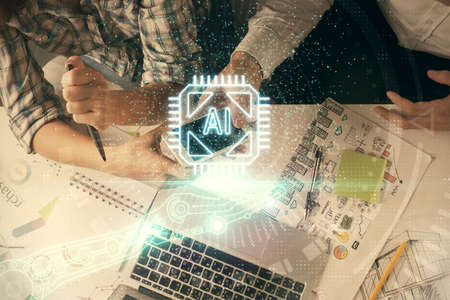 Double exposure of data theme hologram drawing and man and woman working together holding and using...