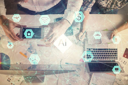 Double exposure of man and woman working together and data theme hologram drawing. Computer...