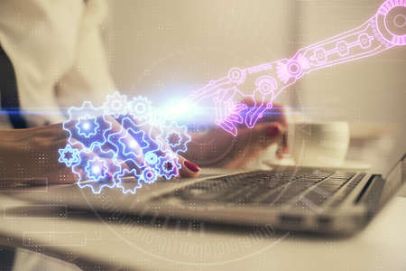 Multi exposure of woman hands working on computer and data theme hologram drawing. Tech concept.