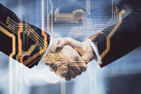 Double exposure of tech hologram and handshake of two men. Deal concept.