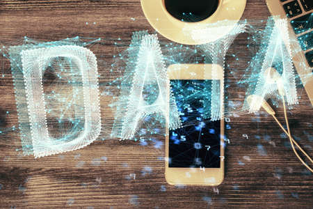 Double exposure of technology theme drawing over work table desktop. Top view. Global data analysis concept.の写真素材