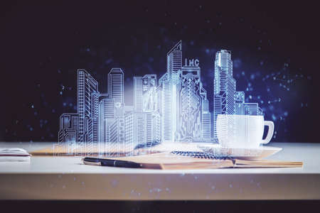 Double exposure of buildings drawing and desktop with coffee and items on table background. Concept of smart cityの写真素材