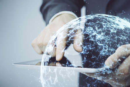 Double exposure of man's hands holding and using a phone and social network theme drawing.