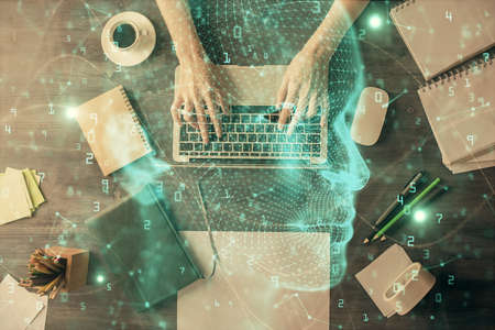 Double exposure of woman working on computer andhuman brain hologram drawing. Top View. Ai concept.