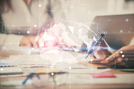 Multi exposure of woman hands working on computer and brain hologram drawing. Ai concept.