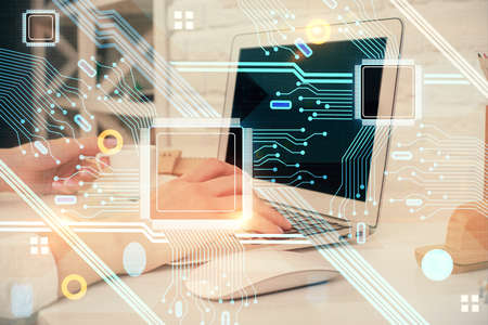 Double exposure of woman hands working on computer and data theme hologram drawing. Tech concept.