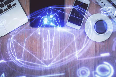 Double exposure of education theme drawing over table with phone. Top view. Science education concept.の写真素材