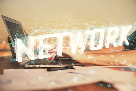 Multi exposure of woman hands working on computer and data theme hologram drawing. Tech concept.の写真素材