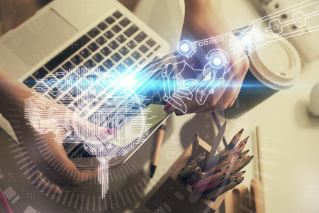 Multi exposure of woman hands working on computer and human brain hologram drawing. Ai tech concept.の写真素材