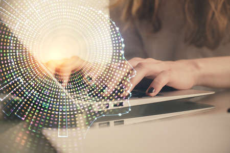 Double exposure of woman hands working on computer and brain hologram drawing. Ai concept.の写真素材