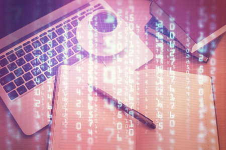 Multi exposure of data theme drawing hologram over topview work desk background with computer....