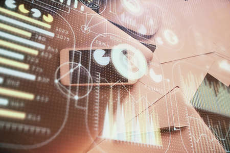 Double exposure of technology theme drawing over work table desktop. Top view. Global data analysis...