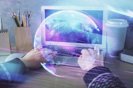 Double exposure of woman hands typing on computer and technology theme drawing. High Tech concept.