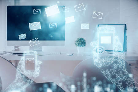 Multi exposure of envelops drawings and office interior background. E-mail concept.の写真素材