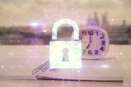 Multi exposure of lock drawings and desk with open notebook background. Concept of securityの写真素材