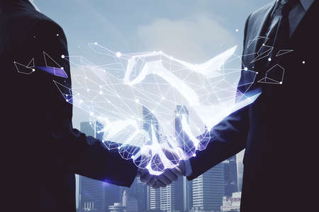 Double exposure of hand shake drawing hologram and handshake of two men.の写真素材