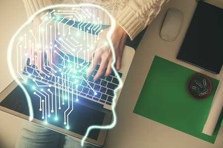 Double exposure of woman working on computer andhuman brain hologram drawing. Top View. Ai concept.