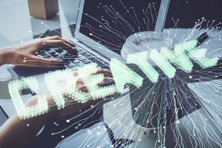 Double exposure of woman hands typing on computer and creative drawing. Start up concept.