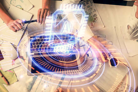 Double exposure of man and woman working together and technology theme drawing hologram. Big data...