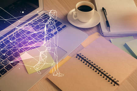 Double exposure of creative drawing and desktop with coffee and items on table background. Concept of start upの写真素材