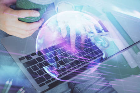 Double exposure of woman hands typing on computer and technology theme drawing. High Tech concept.