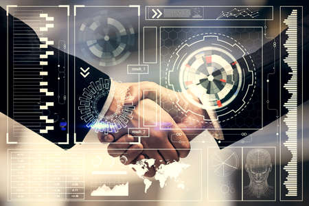 Double exposure of data theme hologram and handshake of two men. Partnership in IT industry concept.