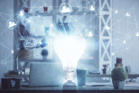 Double exposure of bulb and office interior background. Concept of idea.