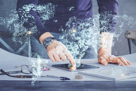 Double exposure of man's hands holding and using a phone and social network theme drawing.の写真素材