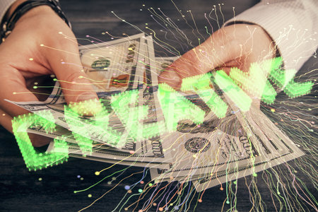 Multi exposure of creative drawing hologram and USA dollars bills and man hands. Start up conceptの写真素材