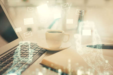 Double exposure of envelope drawing and desktop with coffee and items on table background. Concept of people connection.の写真素材