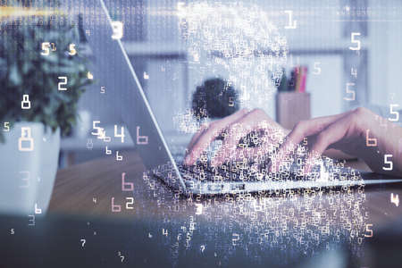 Double exposure of woman hands typing on computer and technology theme drawing. High Tech concept.の写真素材
