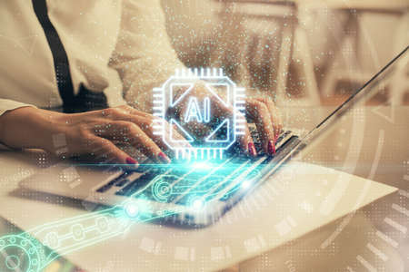 Multi exposure of woman hands working on computer and data theme hologram drawing. Tech concept.の写真素材