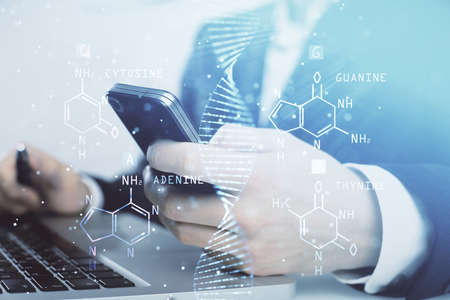 Double exposure of man's hands holding and using a phone and DNA drawing. Medical education concept.